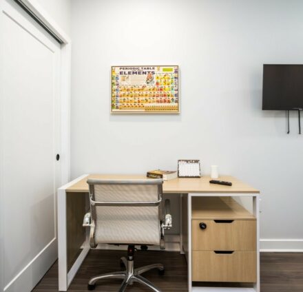 Desk with chair and TV